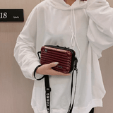 Sac à bandoulière inspiré d'une valise