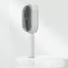 Brosse à cheveux autonettoyante One Click